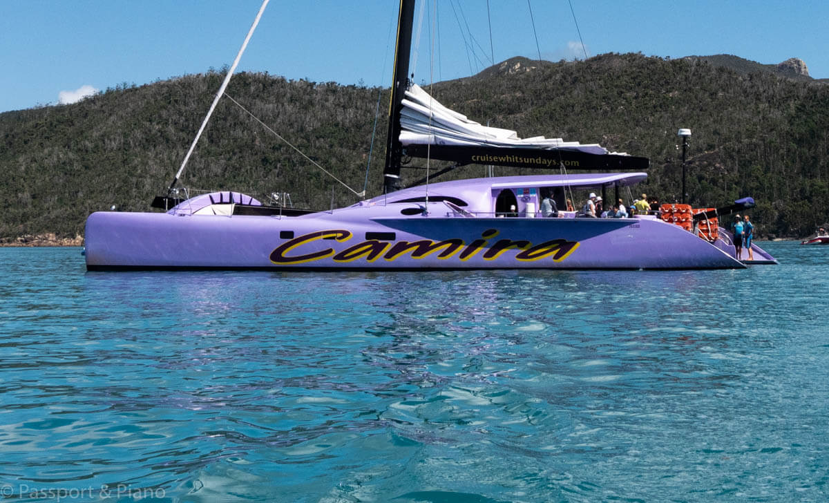 An image of Camira Whitsundays, the purple catamaran