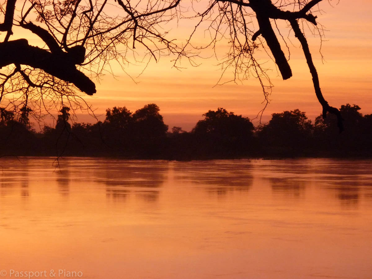 An image of the fantastic orange sky at sunset captured from the balcony of Kayube Bungalows in Zambia