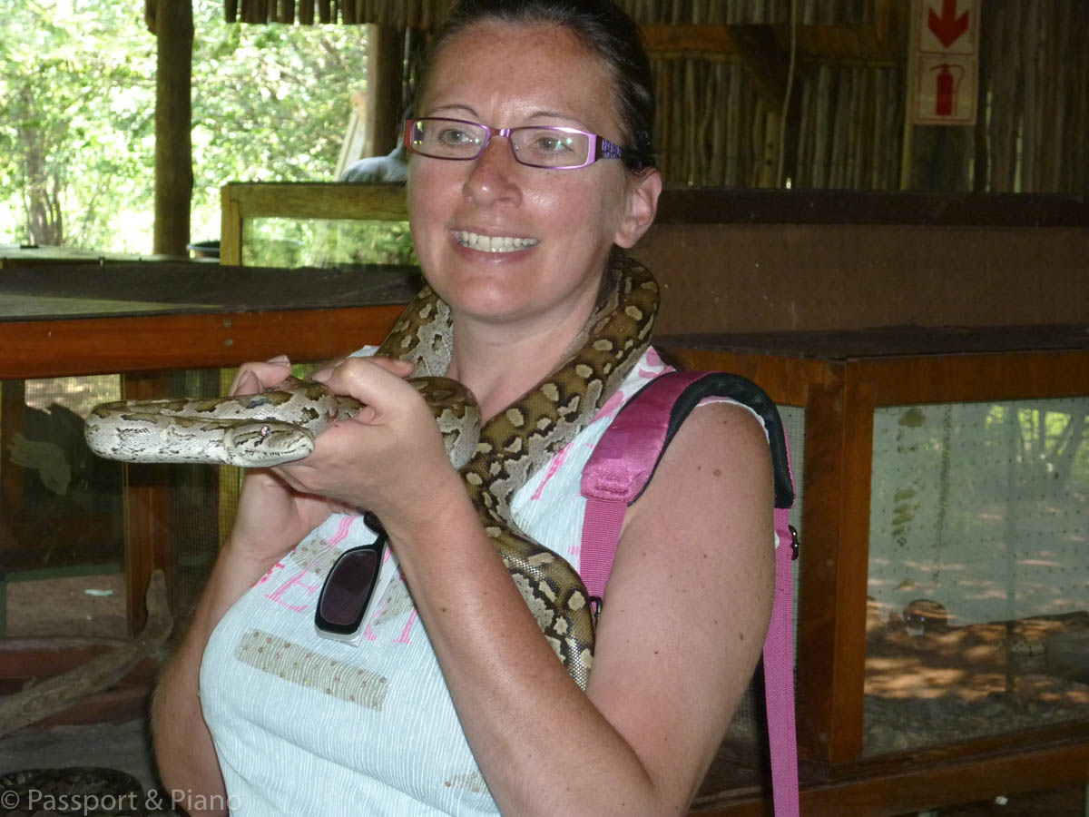 image of me (Fiona) holding a snake around my neck at Caracal Biodiversity centre