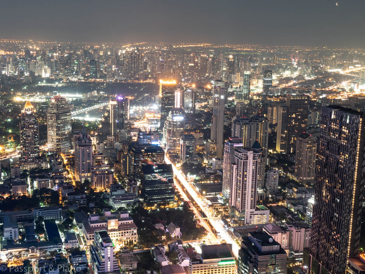 An image of the skyline of Bangkok lit up after dark