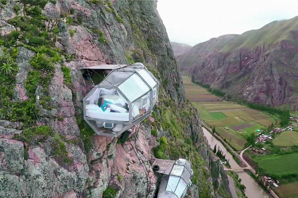 An image of the Skylodge pods on the side of the mountain