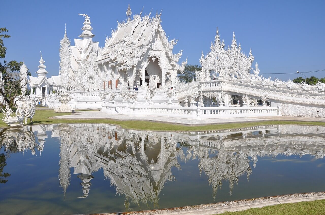 An image of the beautiful white temple Wat Rong Khun in Chiang Rai