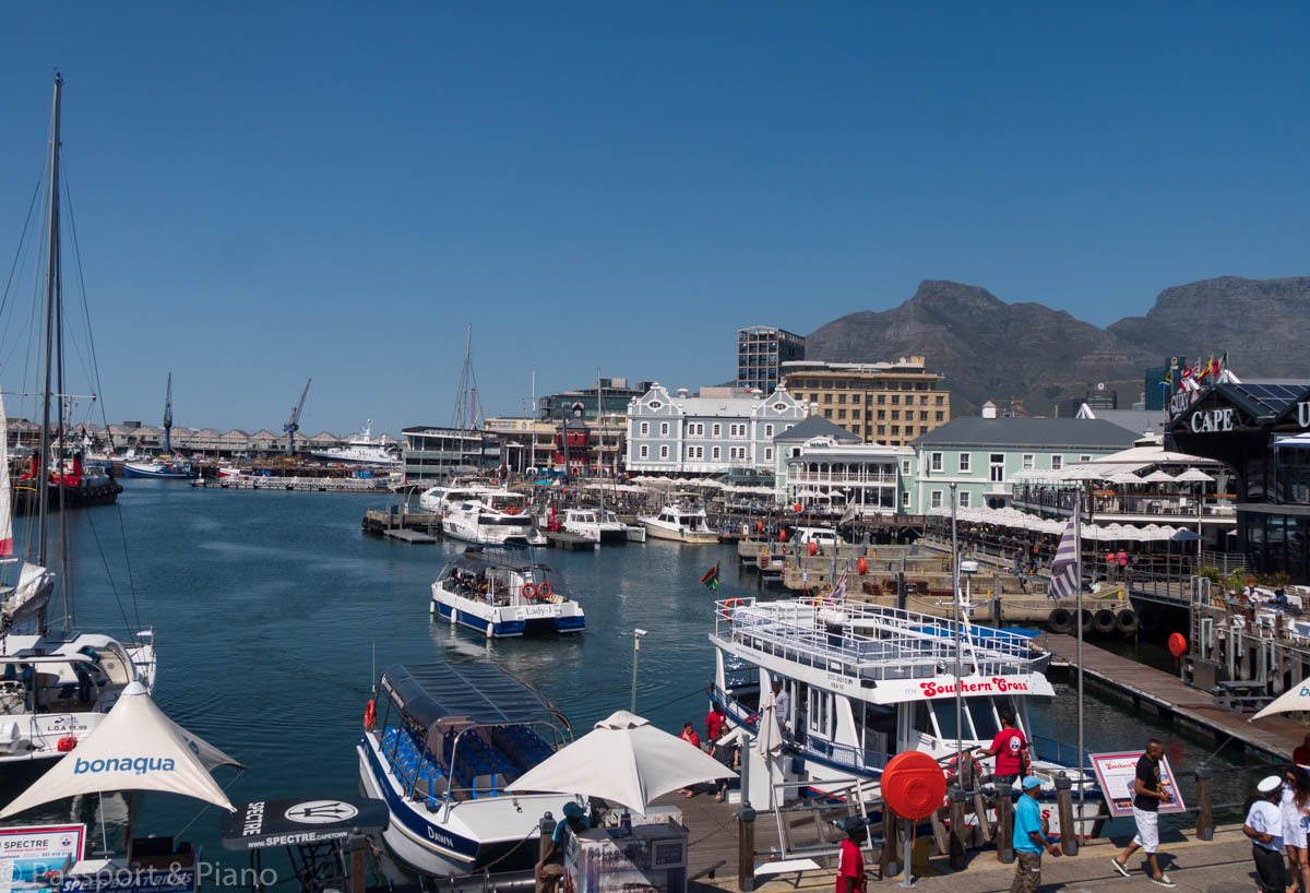 An image of the boats, shops and waterfront restaurants Cape Town