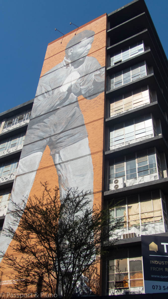 An image of Nelson Mandela boxing, one the best examples of the street art in Maboneng