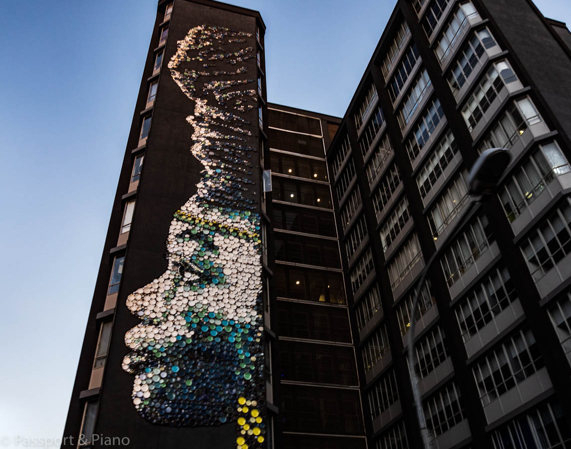 An image of some street art in Johannesburg that depicts a woman's face on the side of a building