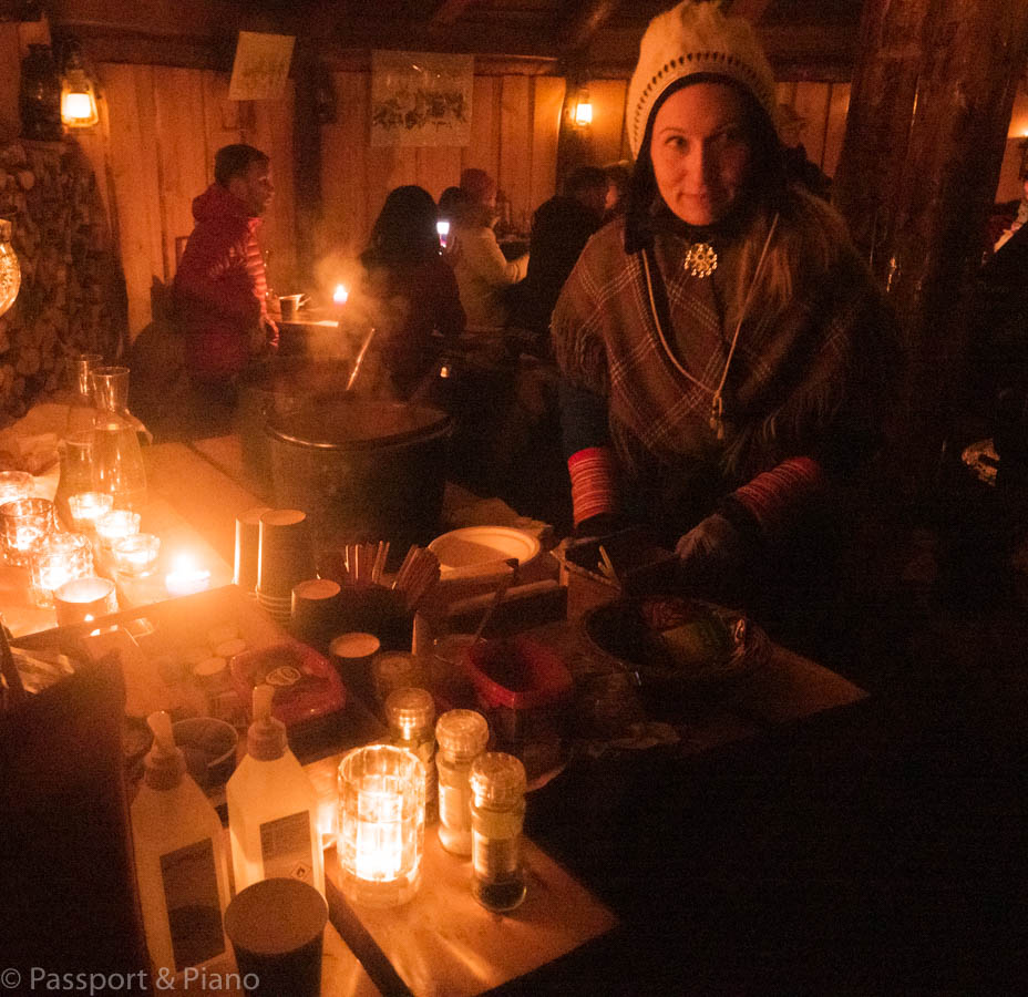 An image of a Sami person cooking lunch
