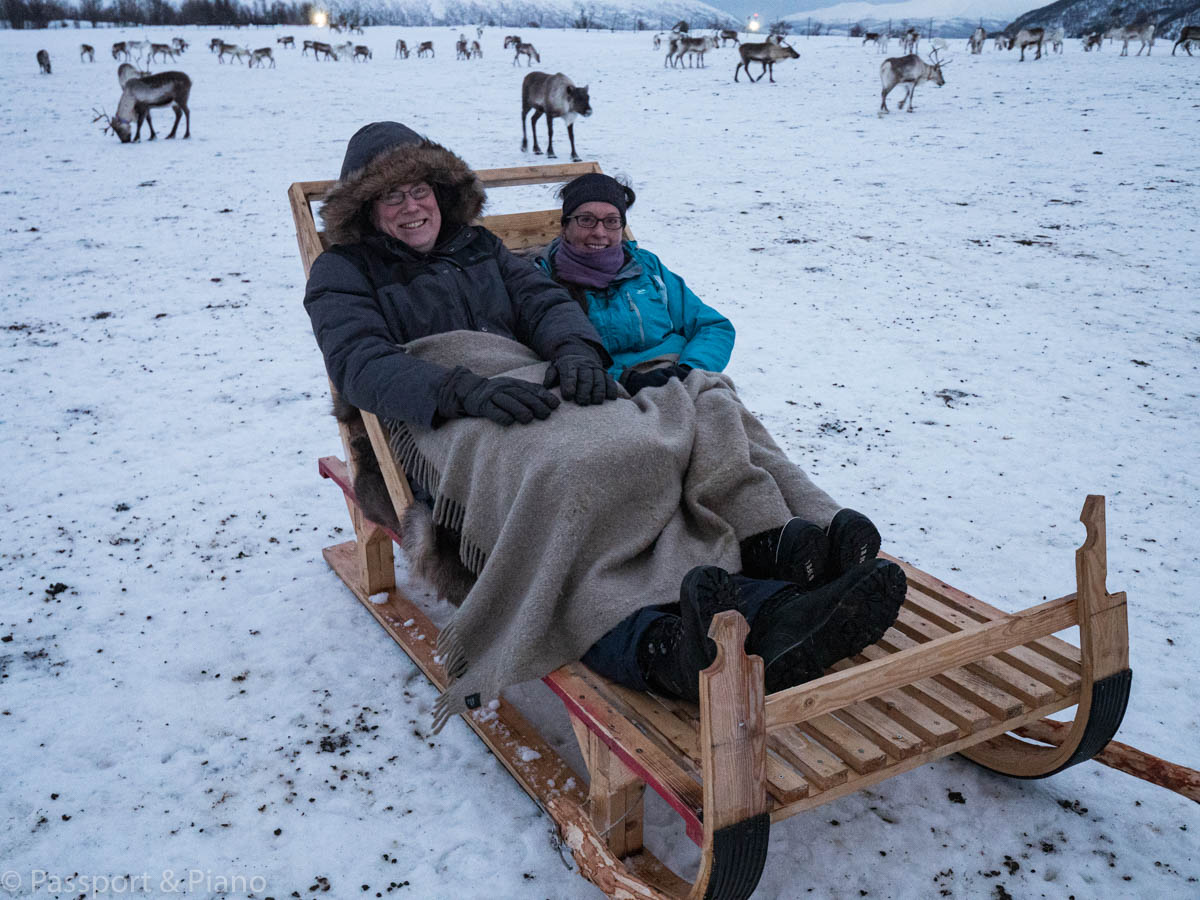 An image of me riding reindeer in tromso