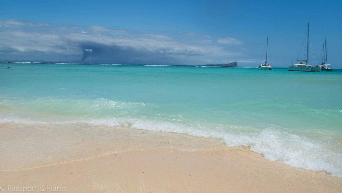 An image of the turquoise sea and white silica sand at Gabriel island; one of the stunning Mauritius beaches