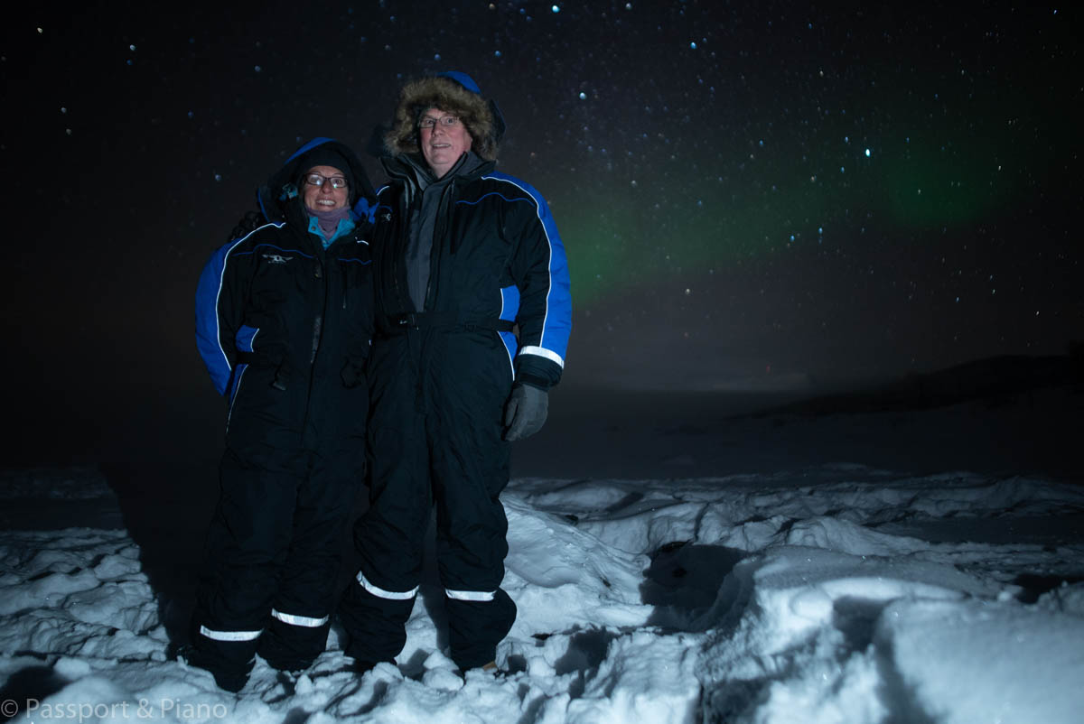 An image of me and Dave from Passport and Piano at Lake Kilpisjarvi on Wandering Owl northern light Tromso minibus tour
