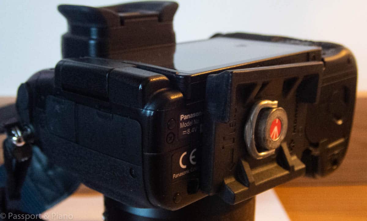 An image of a tripod plate on the base of a Panasonic Lumix camera